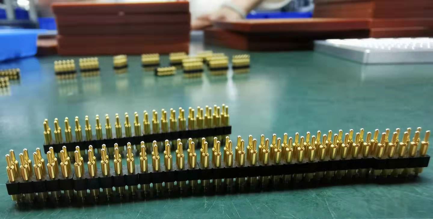 Spring-loaded Pogo pin contacts